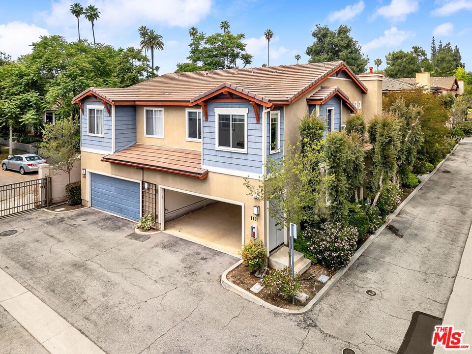 1131 Rosewalk Way Pasadena, CA 91103 - Photo 39 of 42 a house with lots of trees in the background