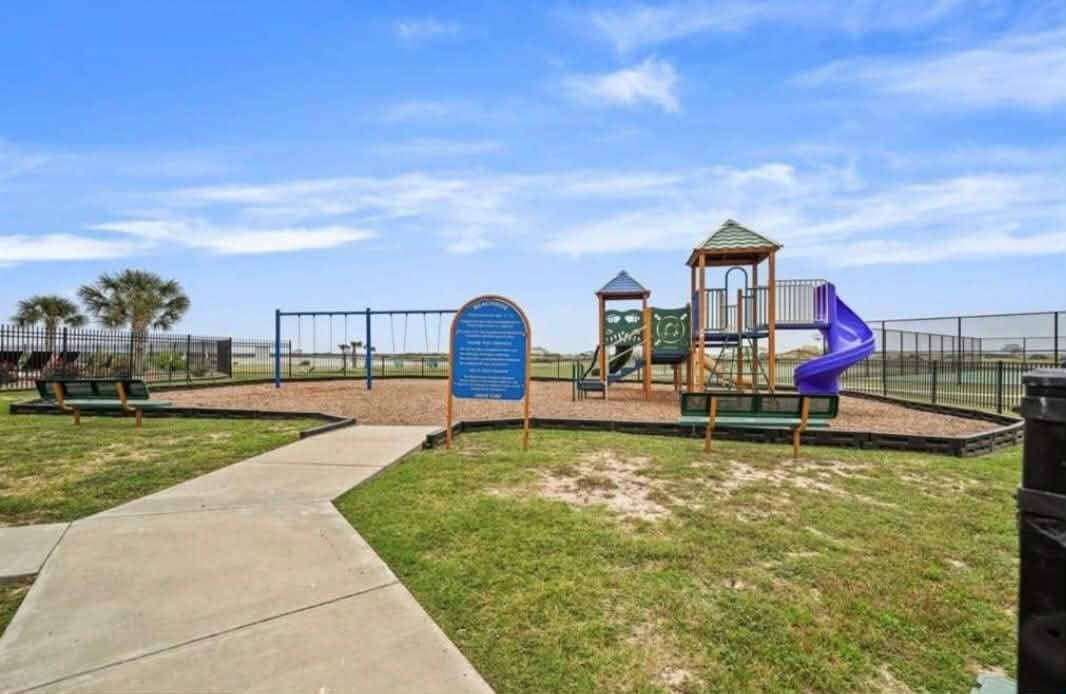 3210 Bay Rdg Drive Palacios, TX 77465 - Photo 4 of 18 a view of a swimming pool with a garden and seating