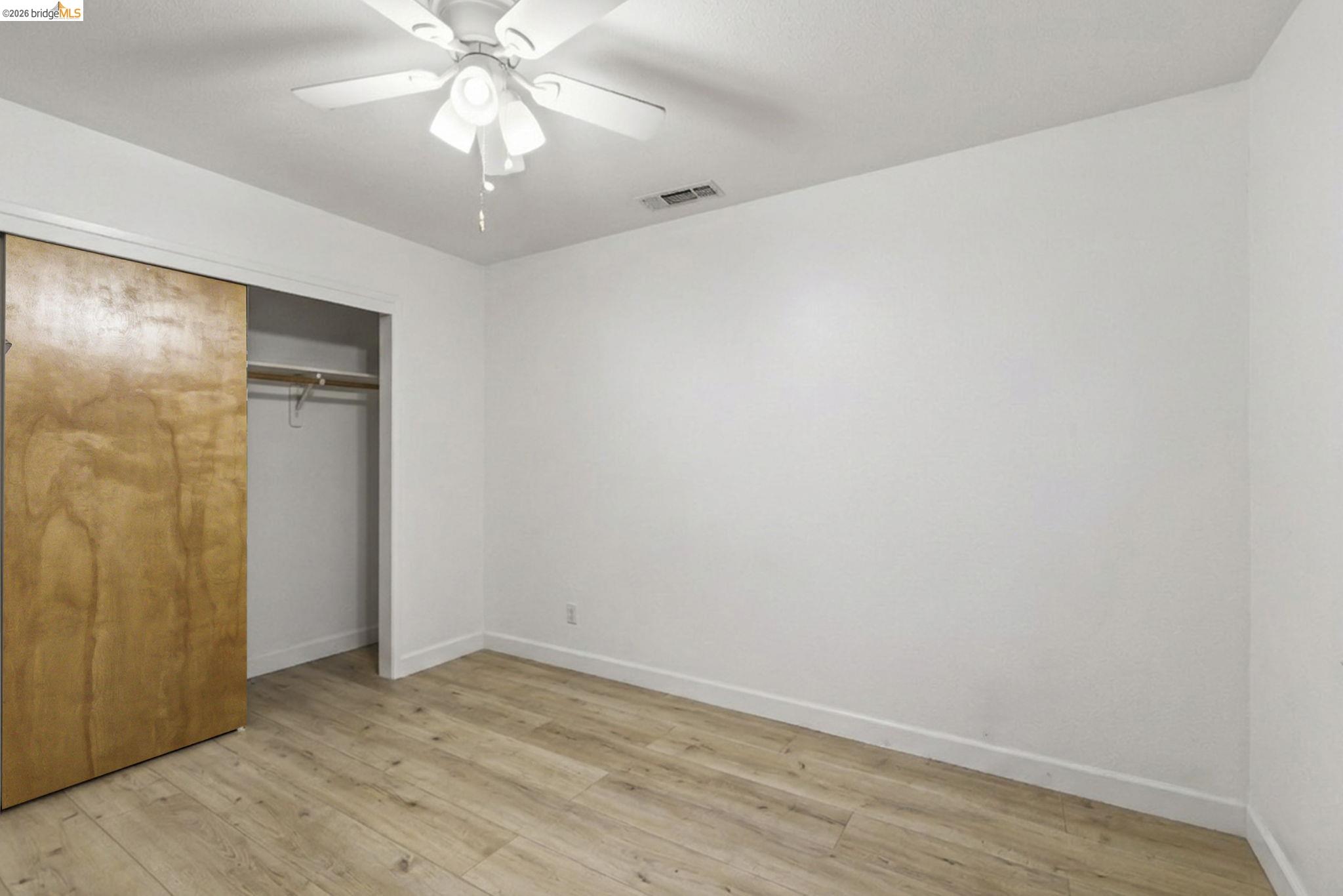 23685 Marble Quarry Road, Unit 8 Columbia, CA 95310 - Photo 17 of 25 wooden floor in an empty room