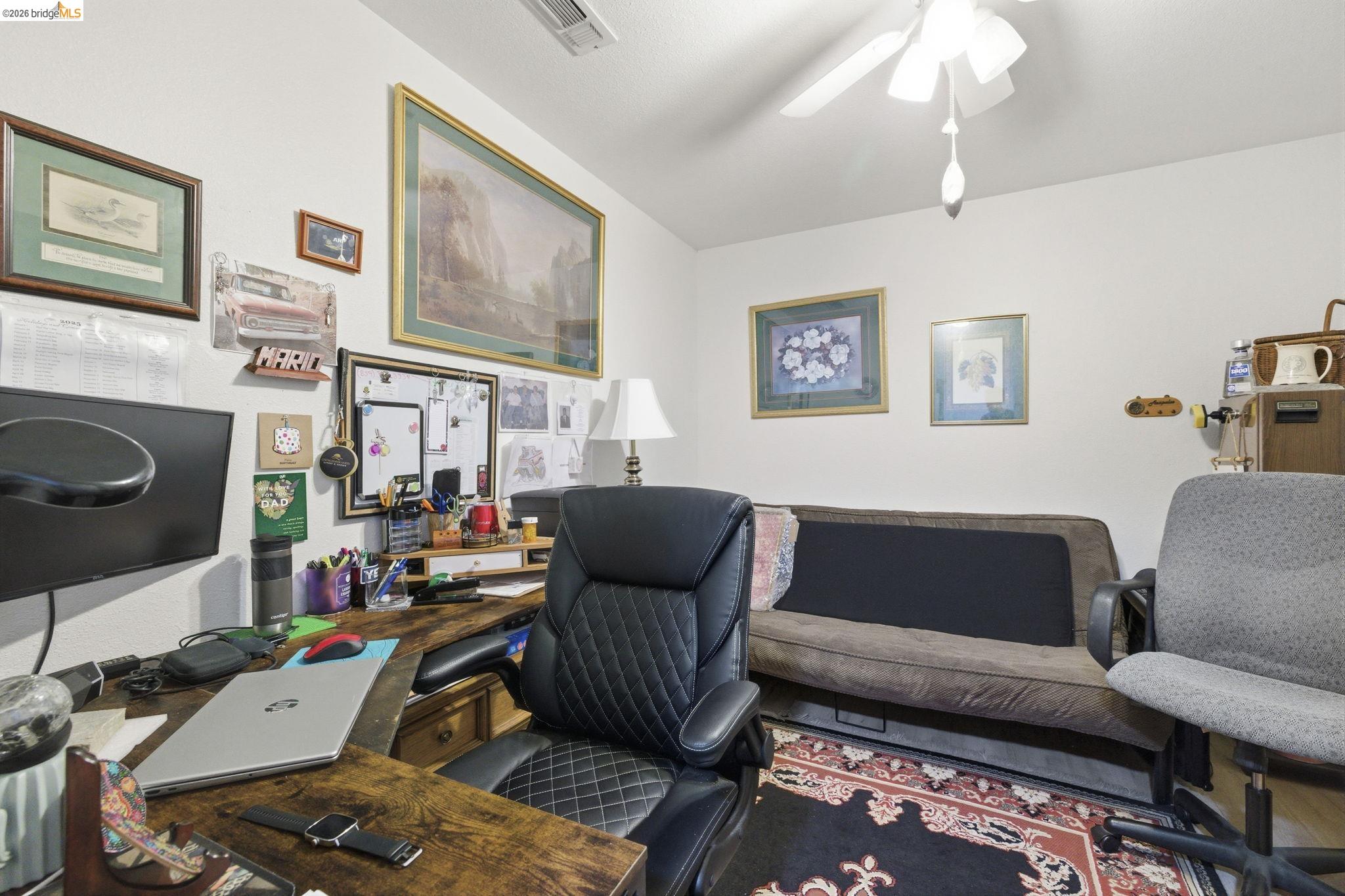23685 Marble Quarry Road, Unit 8 Columbia, CA 95310 - Photo 20 of 25 a living room with furniture and a fireplace