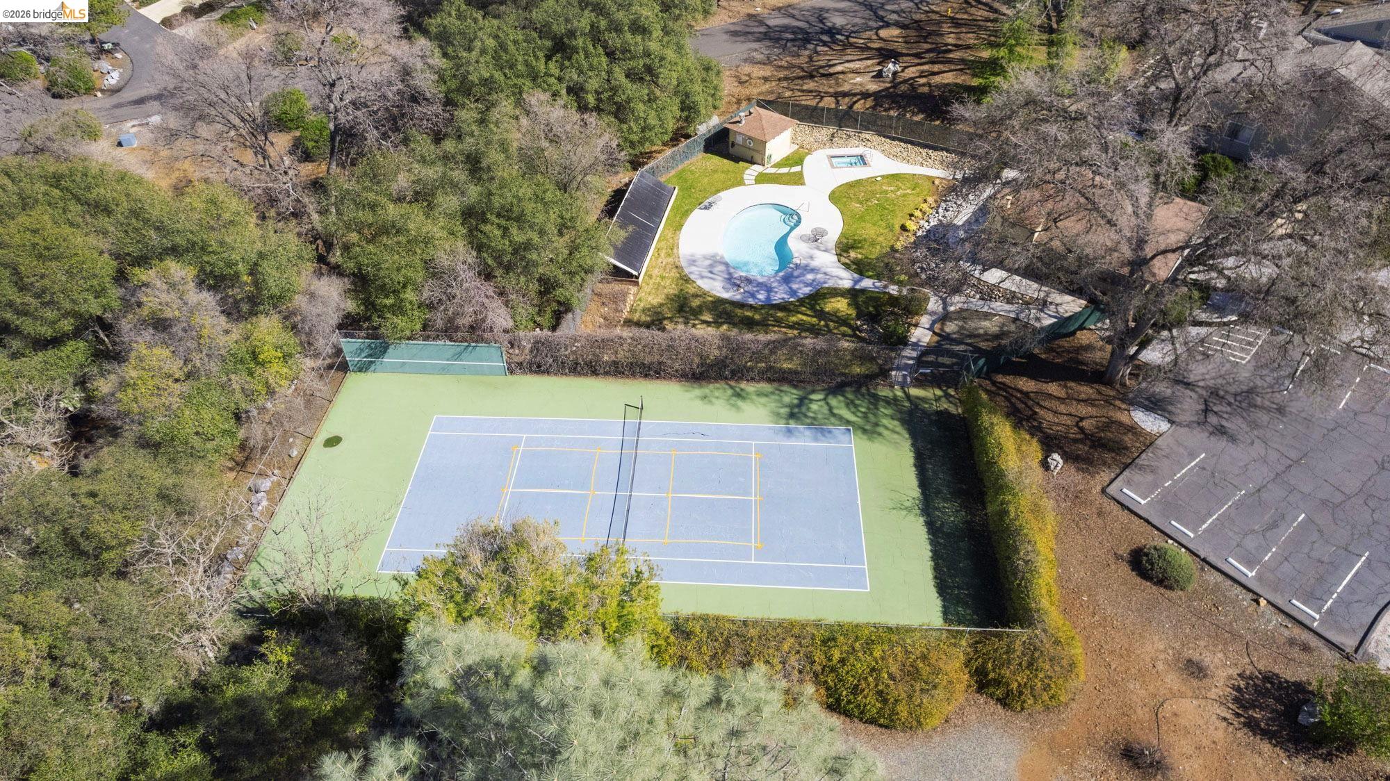 23685 Marble Quarry Road, Unit 8 Columbia, CA 95310 - Photo 23 of 25 a view of a house with a swimming pool