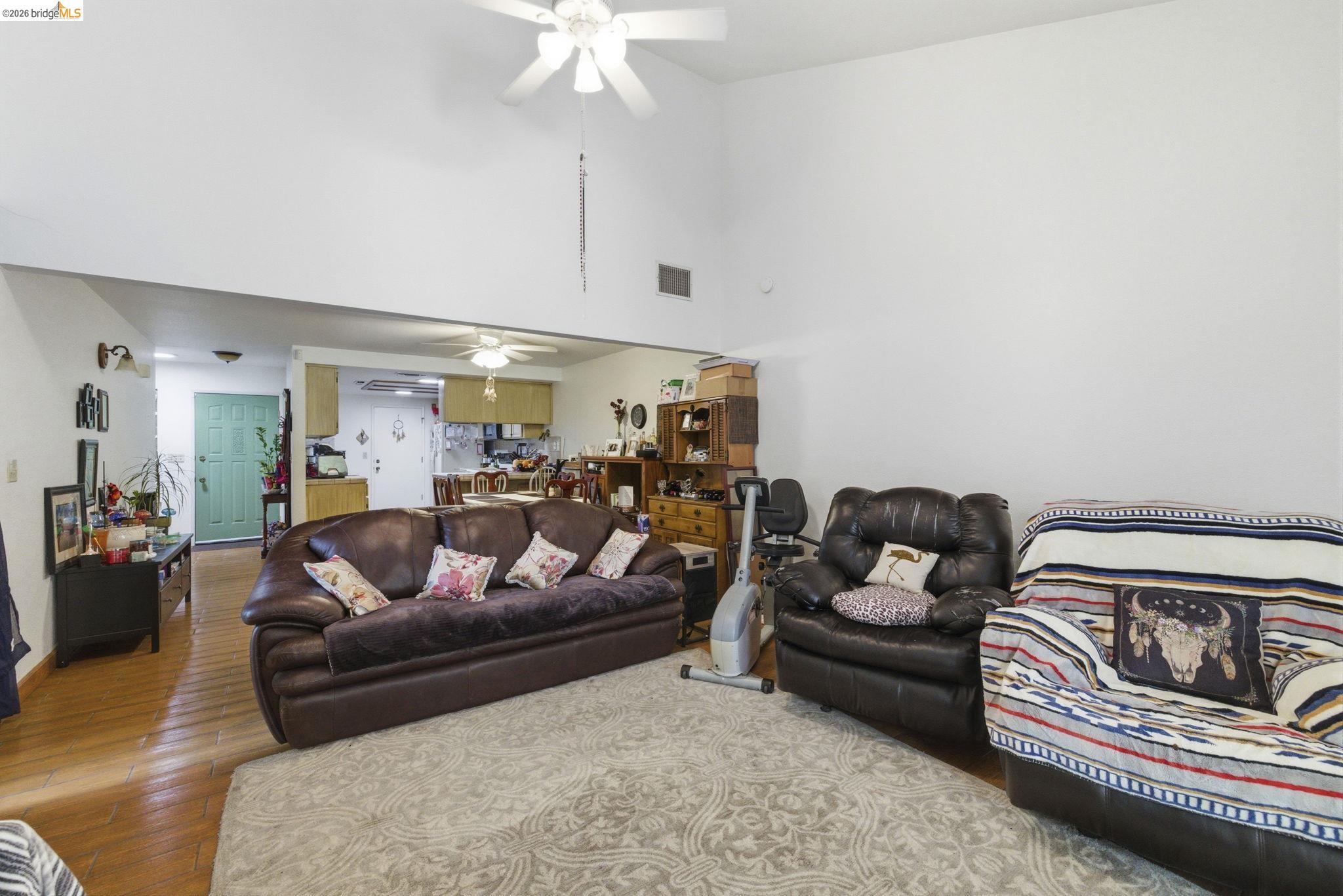 23685 Marble Quarry Road, Unit 8 Columbia, CA 95310 - Photo 10 of 25 a living room with furniture and a chandelier