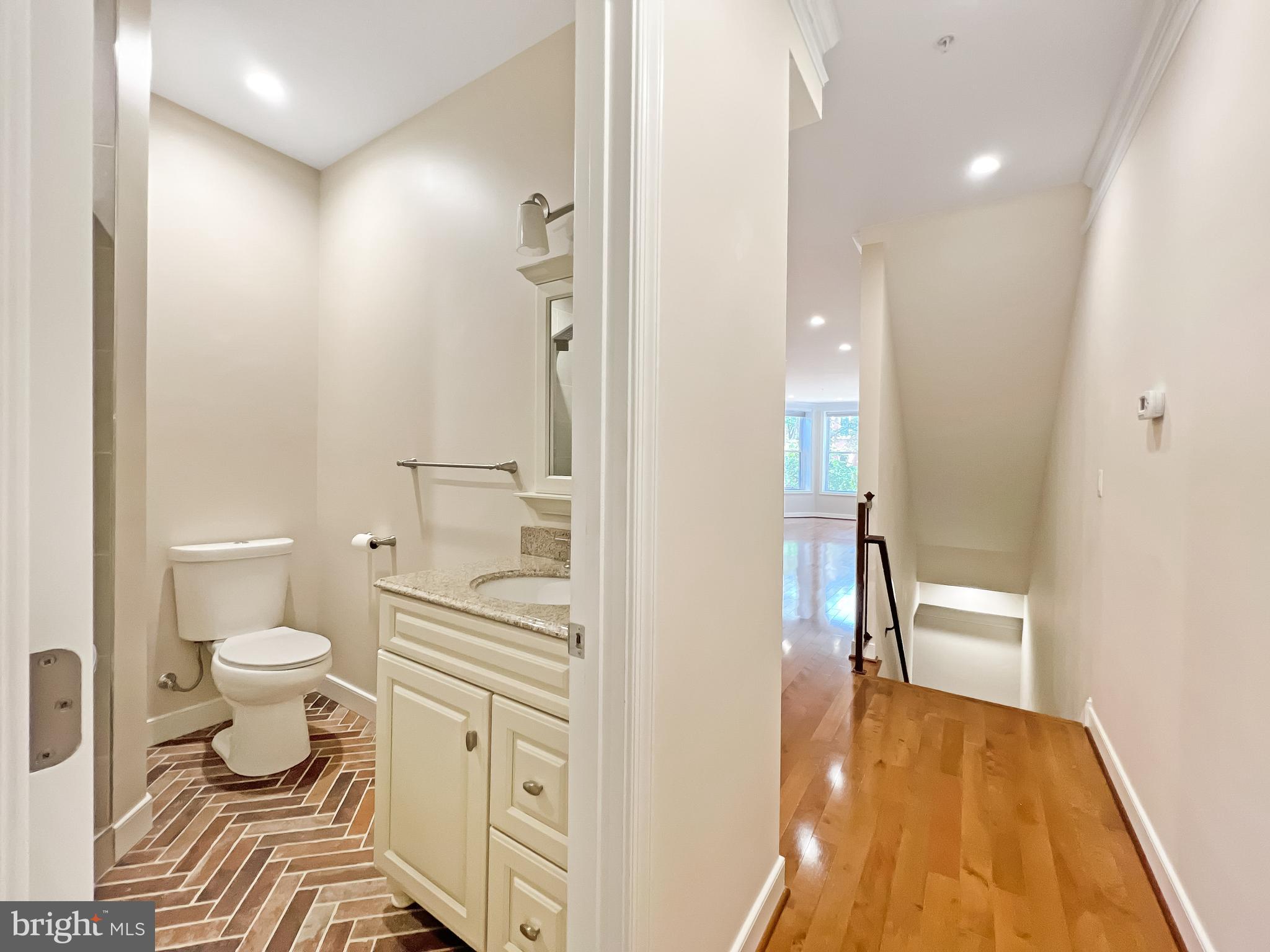 59 R Street Northeast, Unit 1 Washington, DC 20002 - Photo 13 of 35 Hallway Bathroom/ Bathroom One