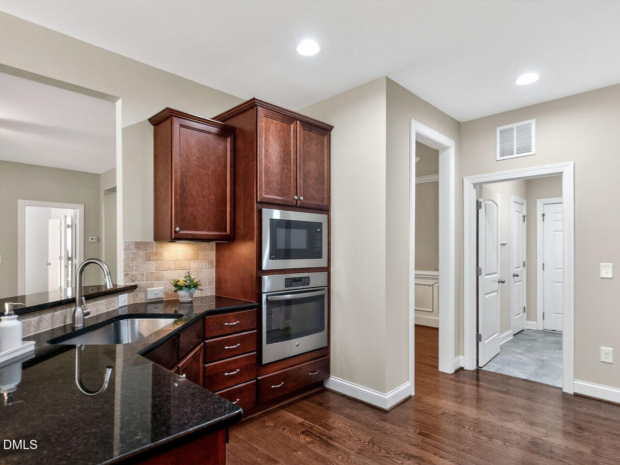 722 Toms Creek Road Cary, NC 27519 - Photo 15 of 42 a kitchen with a refrigerator and a sink