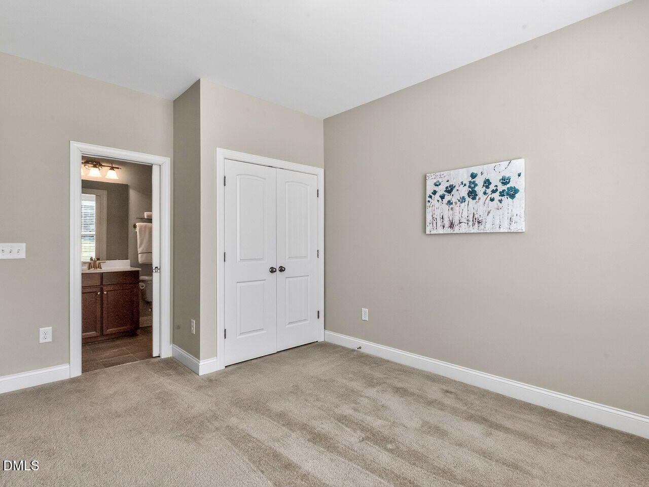 722 Toms Creek Road Cary, NC 27519 - Photo 23 of 42 an empty room with closet and a bathroom