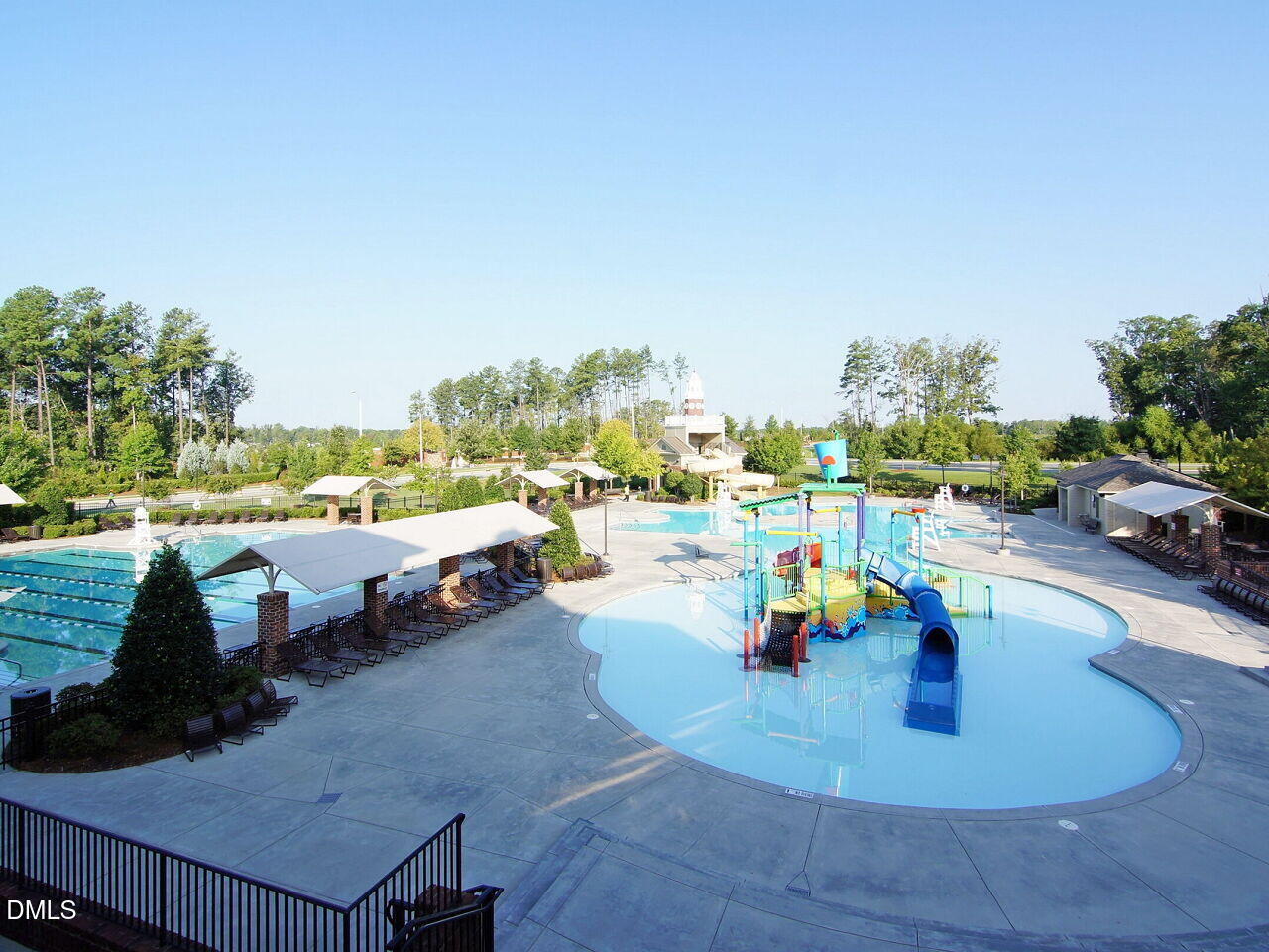 722 Toms Creek Road Cary, NC 27519 - Photo 40 of 42 a view of a swimming pool and deck