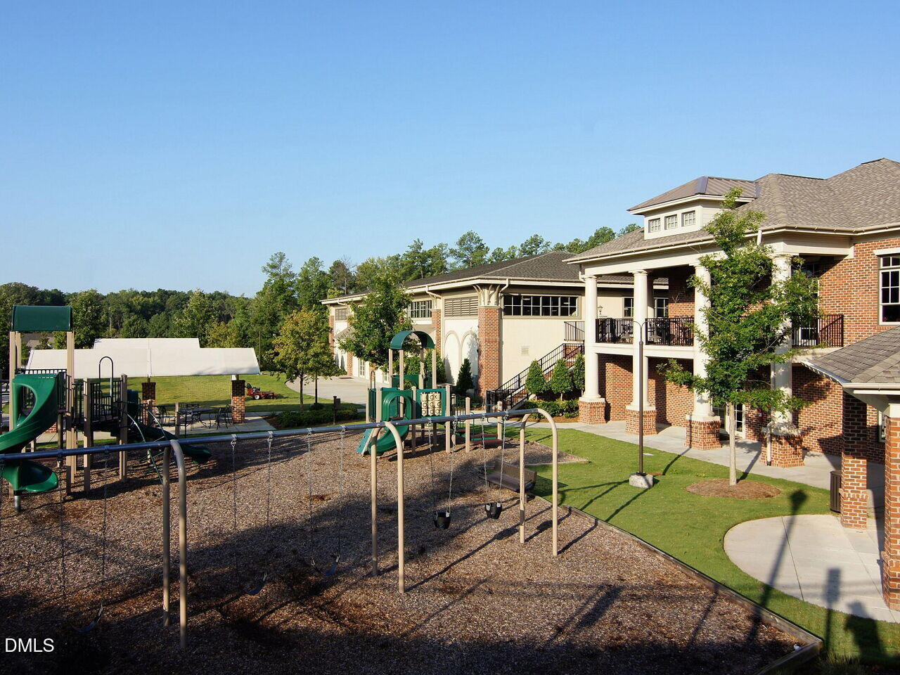 722 Toms Creek Road Cary, NC 27519 - Photo 41 of 42 a front view of a house with garden