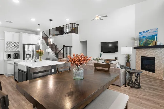 a living room with fireplace furniture and a flat screen tv