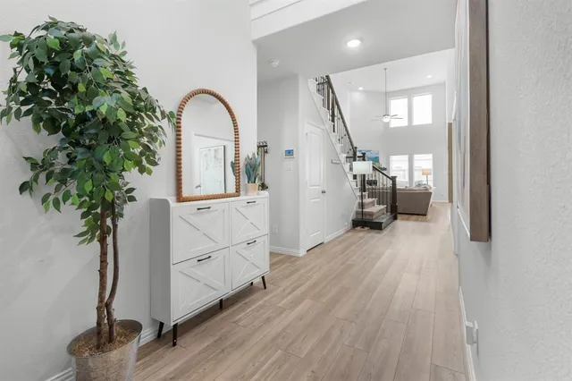 a view of entryway with wooden floor