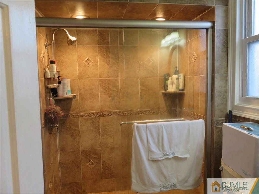 267 Rector Street Perth Amboy, NJ 08861 - Photo 12 of 17 a bathroom with a shower