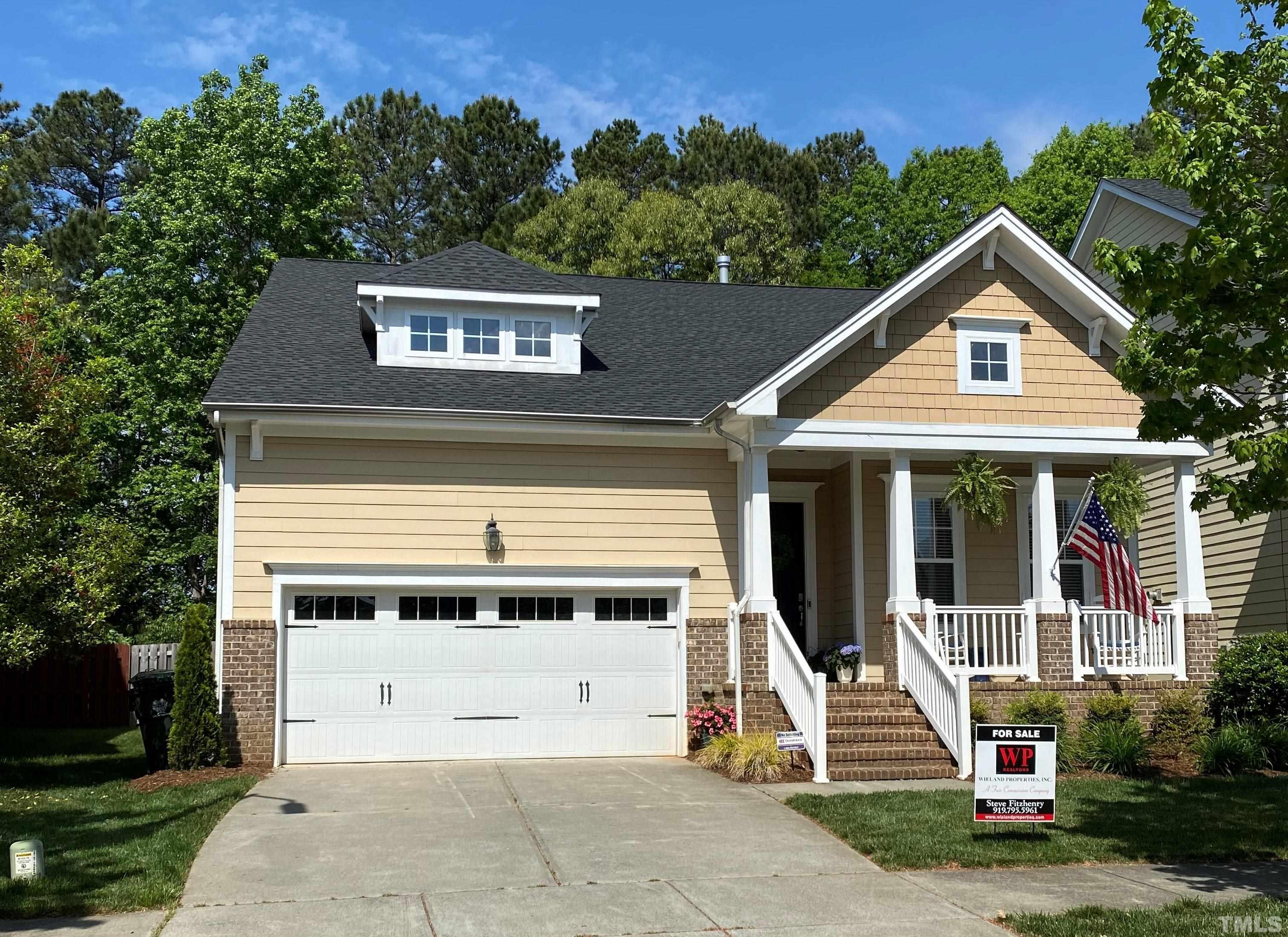 1116 Chapanoke Road Raleigh, NC 27603 - Photo 1 of 42 a view of a house with a yard and potted plants