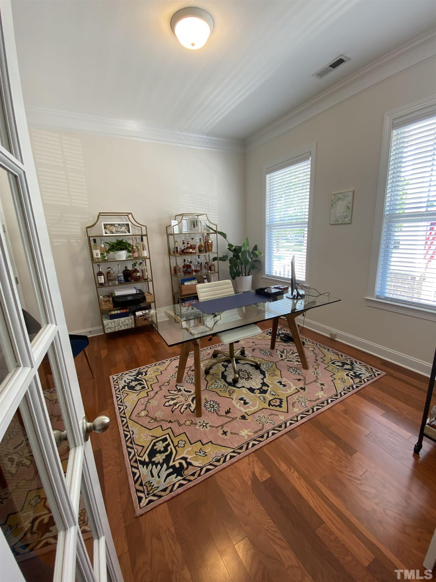 1116 Chapanoke Road Raleigh, NC 27603 - Photo 3 of 42 a living room with furniture and a rug