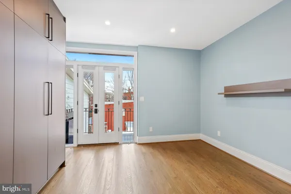 a view of entryway with wooden floor