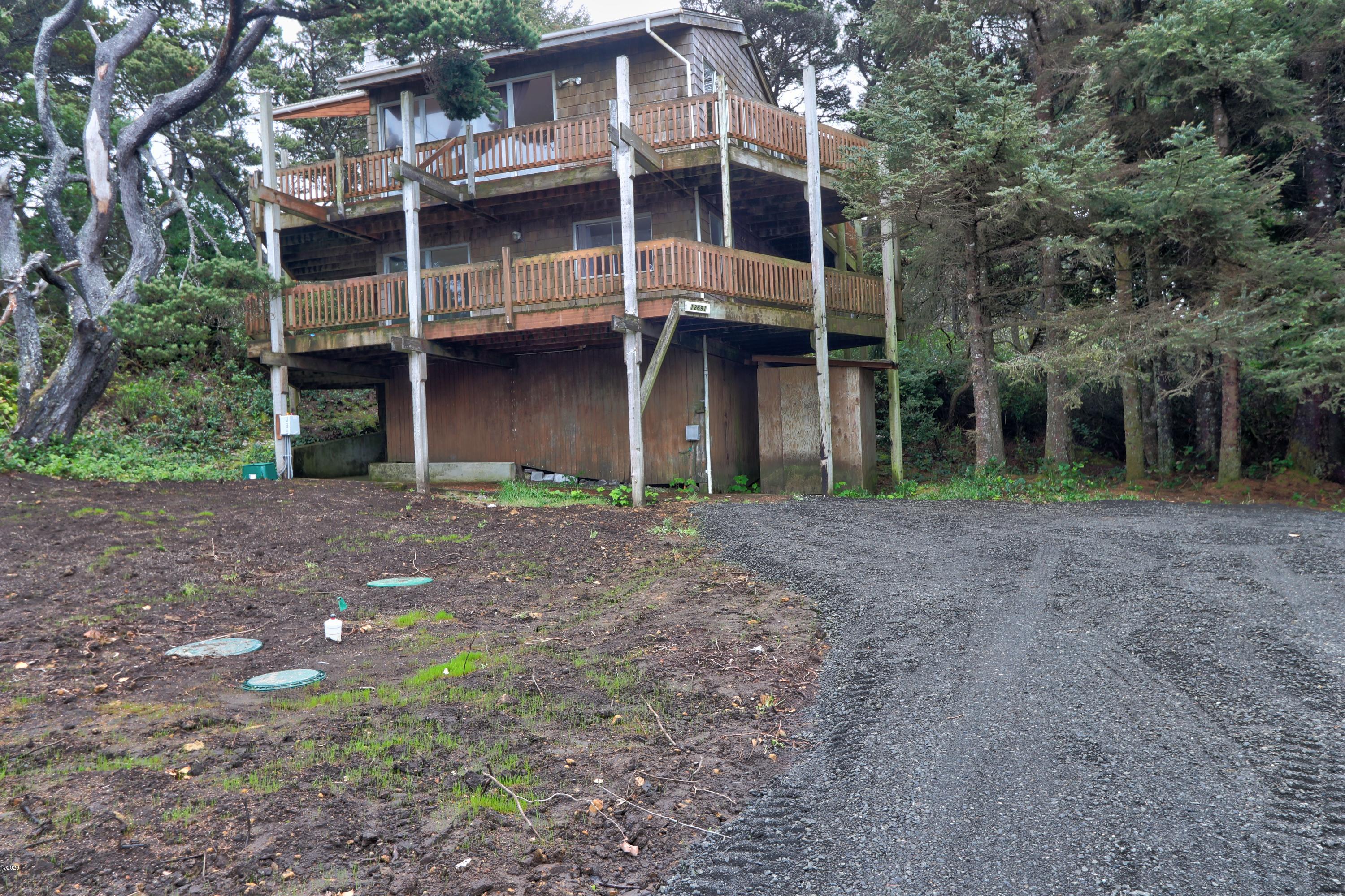 12791 Northwest Raspberry Lane Seal Rock, OR 97376 - Photo 1 of 1 Front of home