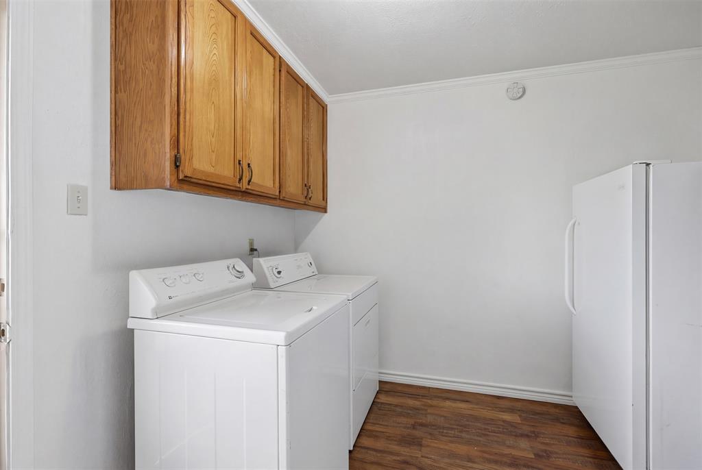 1644 County Road 195 Dublin, TX 76446 - Photo 11 of 34 a utility room with a sink washer and dryer