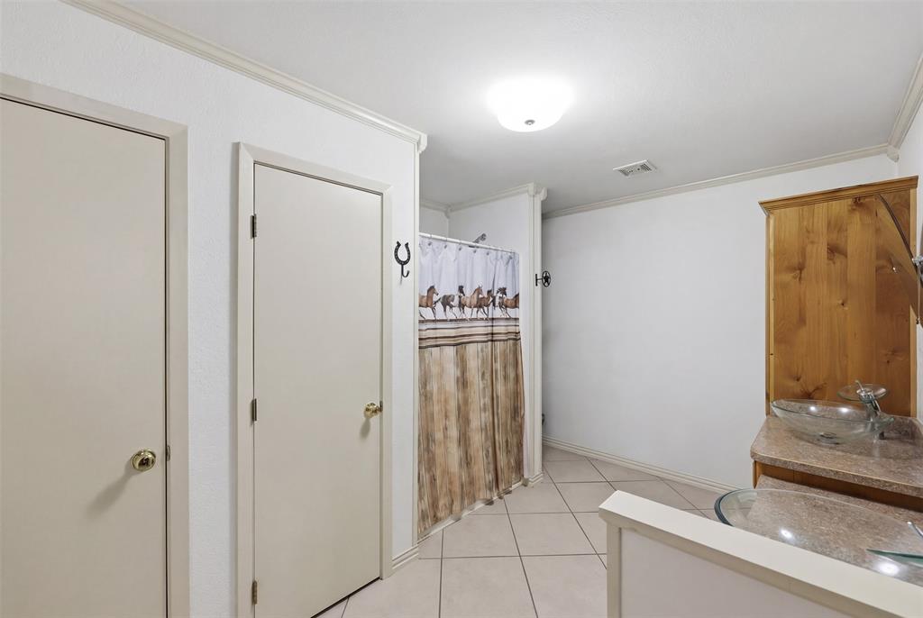 1644 County Road 195 Dublin, TX 76446 - Photo 17 of 34 a view of a bathroom with mirror