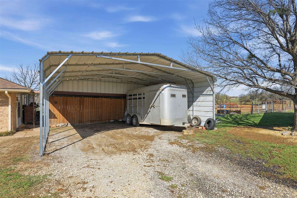 1644 County Road 195 Dublin, TX 76446 - Photo 3 of 34 a view of a house with a yard