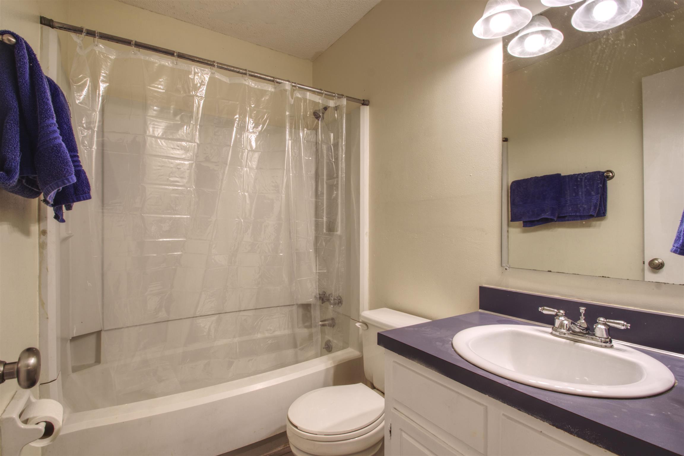 804 Fall Court Antioch, TN 37013 - Photo 11 of 14 a bathroom with a granite countertop sink toilet and shower