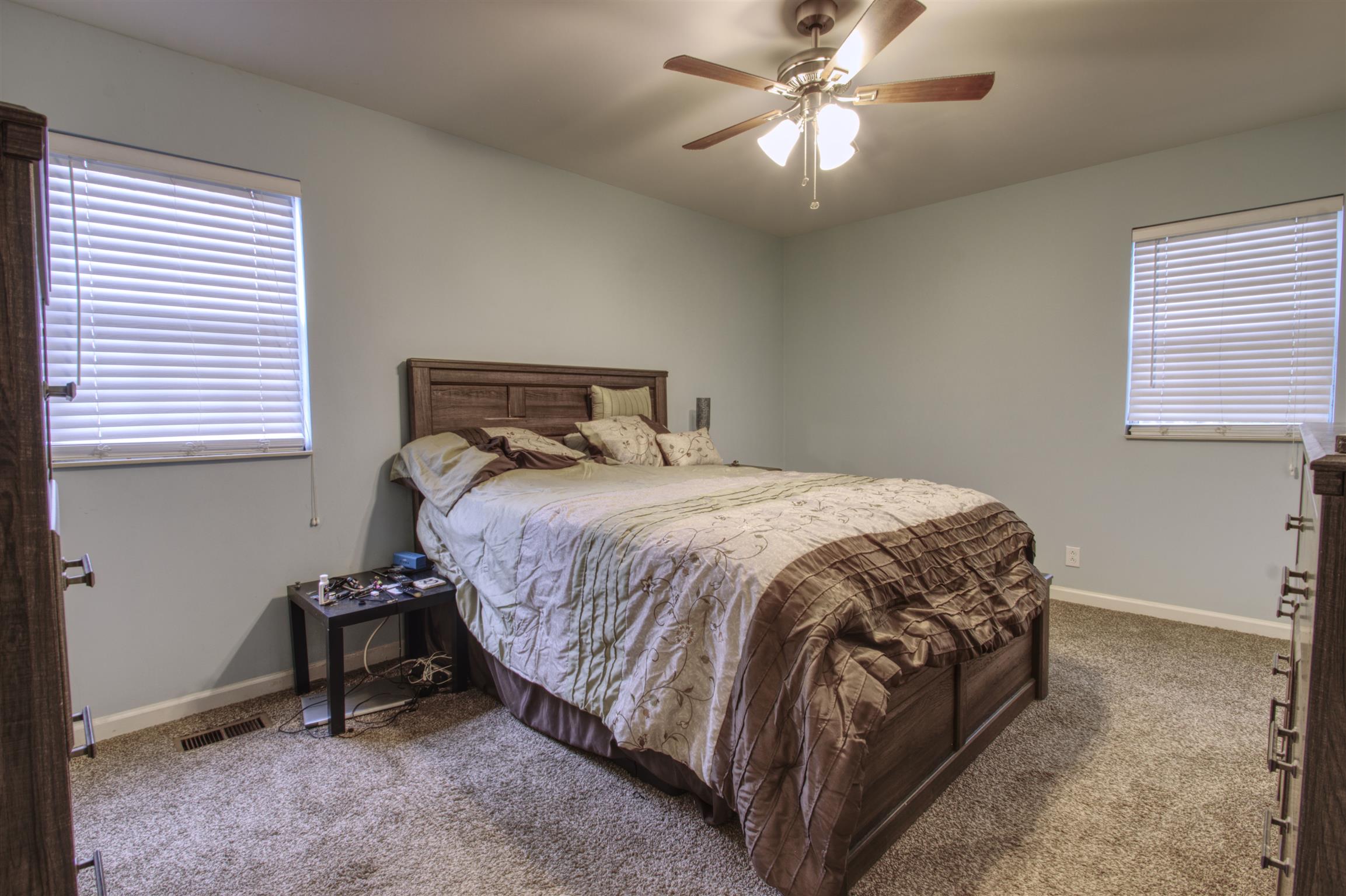 804 Fall Court Antioch, TN 37013 - Photo 12 of 14 a bedroom with a bed and a ceiling fan