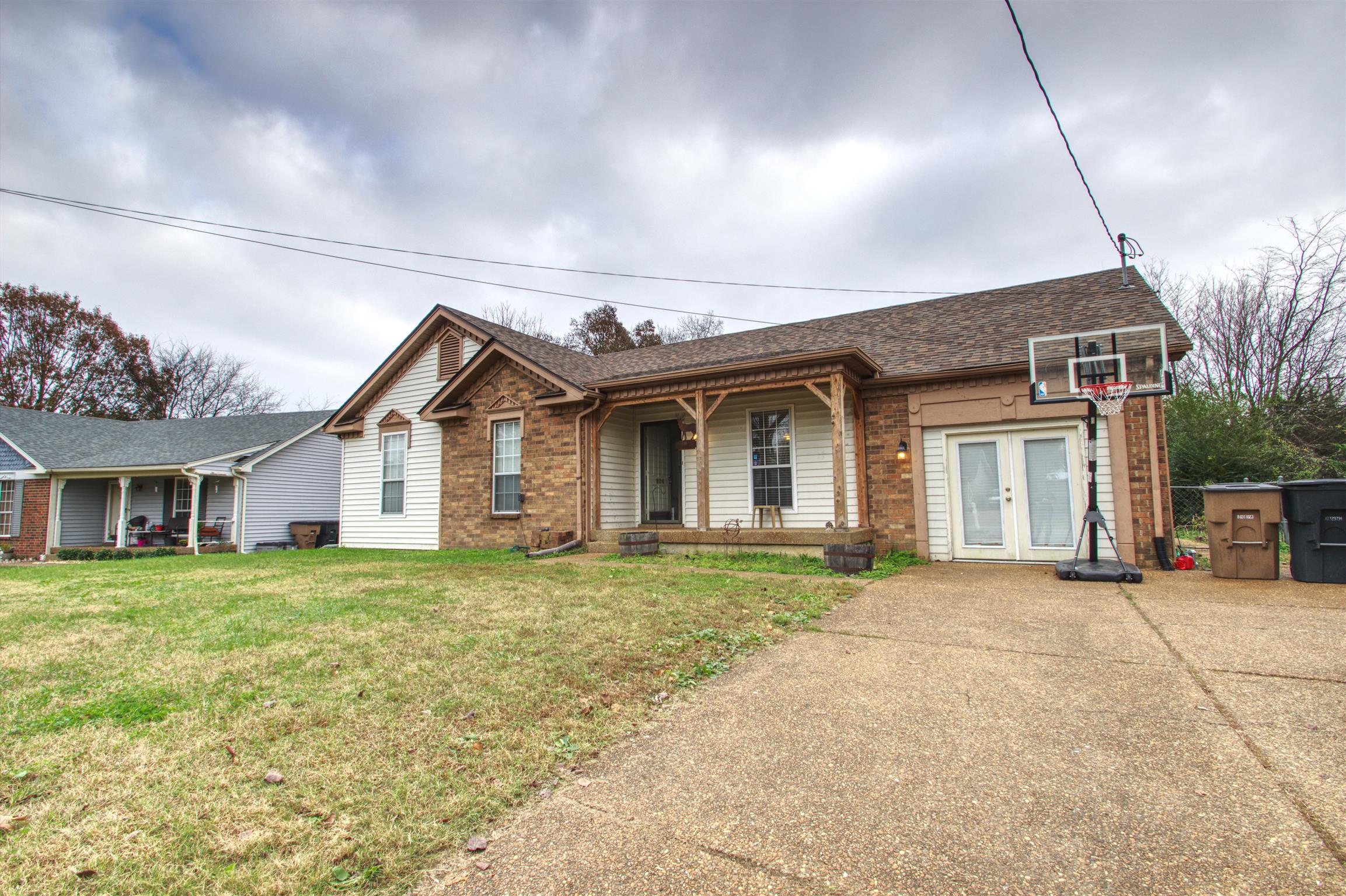 804 Fall Court Antioch, TN 37013 - Photo 2 of 14 a front view of a house with a yard and garage