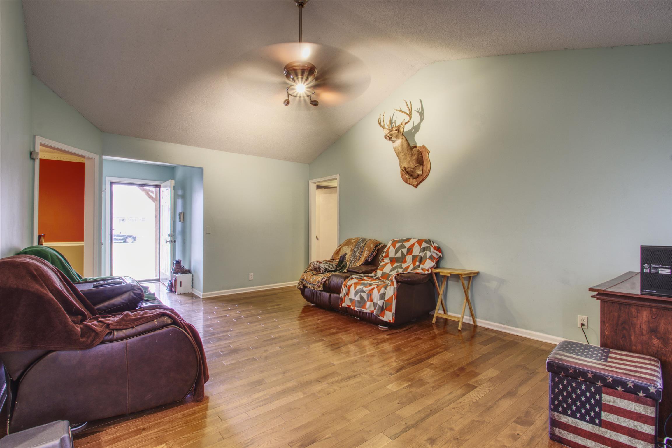 804 Fall Court Antioch, TN 37013 - Photo 3 of 14 a spacious bedroom with a bed and wooden floor