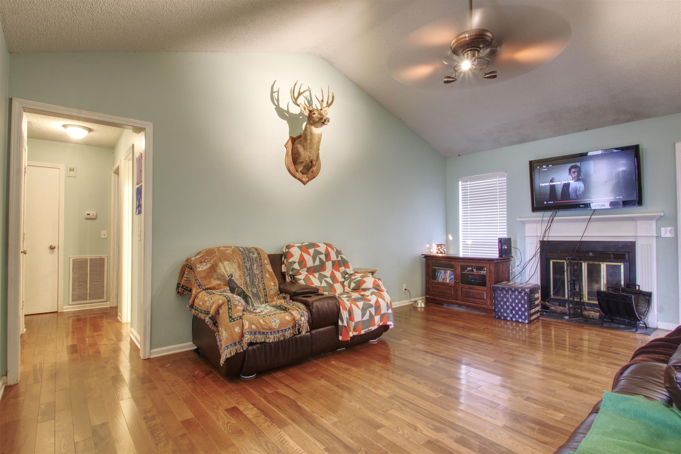 804 Fall Court Antioch, TN 37013 - Photo 4 of 14 a living room with furniture and a fireplace