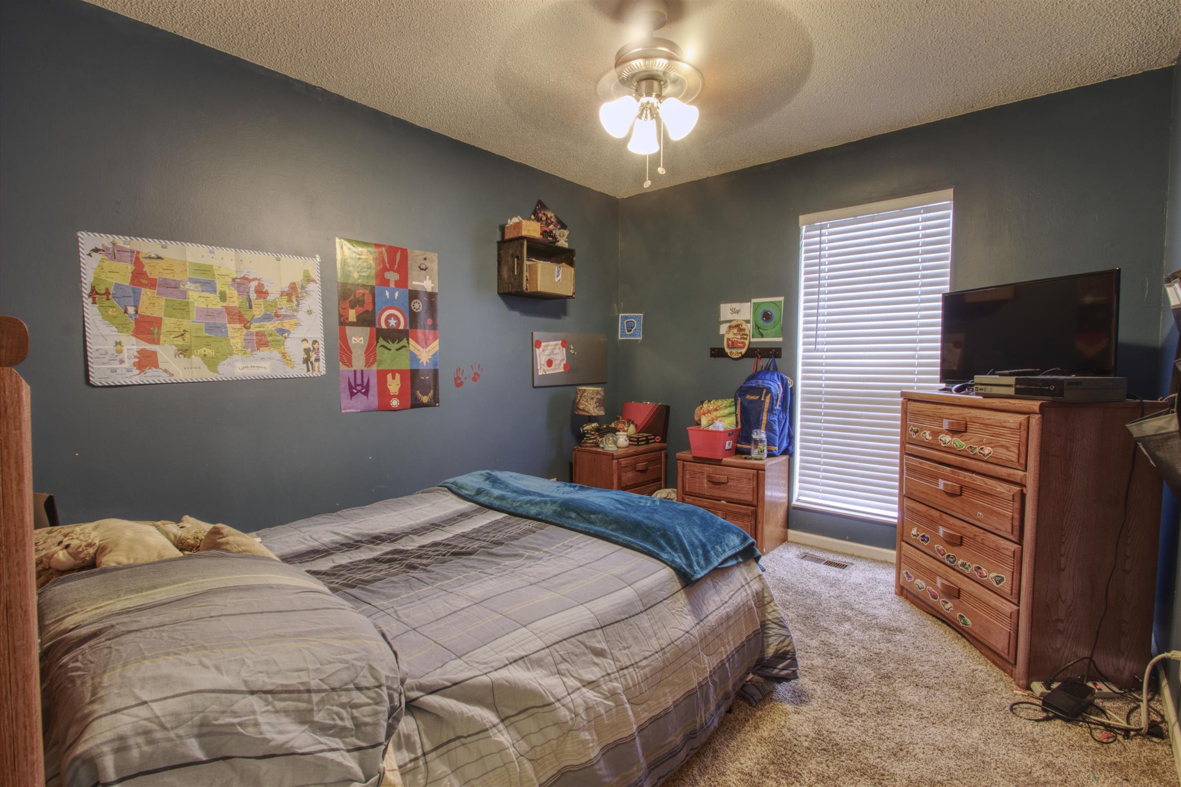 804 Fall Court Antioch, TN 37013 - Photo 10 of 14 a bedroom with a bed and furniture