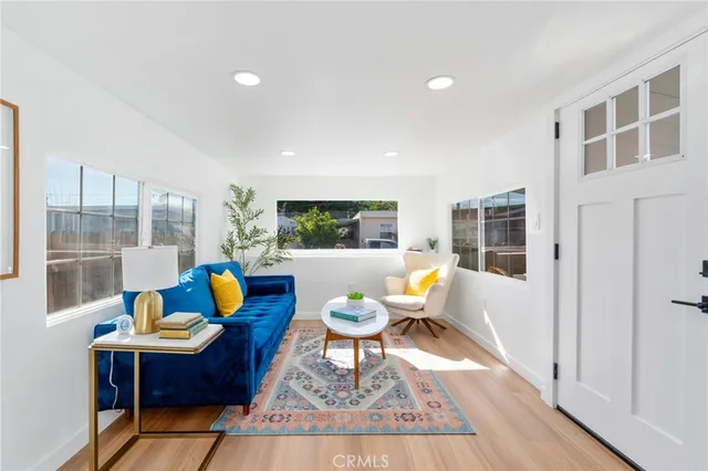 a bathroom with a sink a toilet and a shower