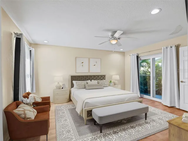a bathroom with a toilet and a shower curtain