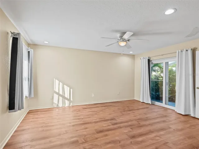a view of a hallway with washer and dryer