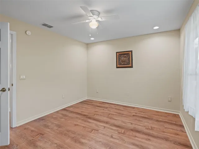 an aerial view of a house with a garden and plants