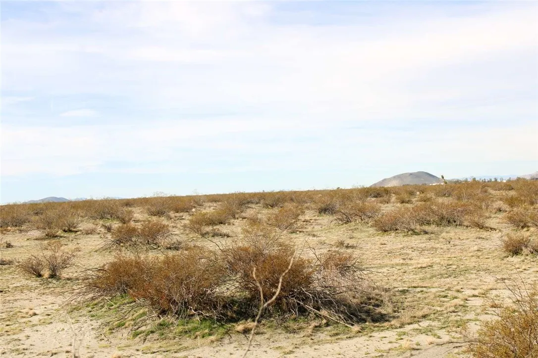 179940 Johnson Road Phelan, CA 92371 - Photo 7 of 14 an aerial view of houses covered in snow