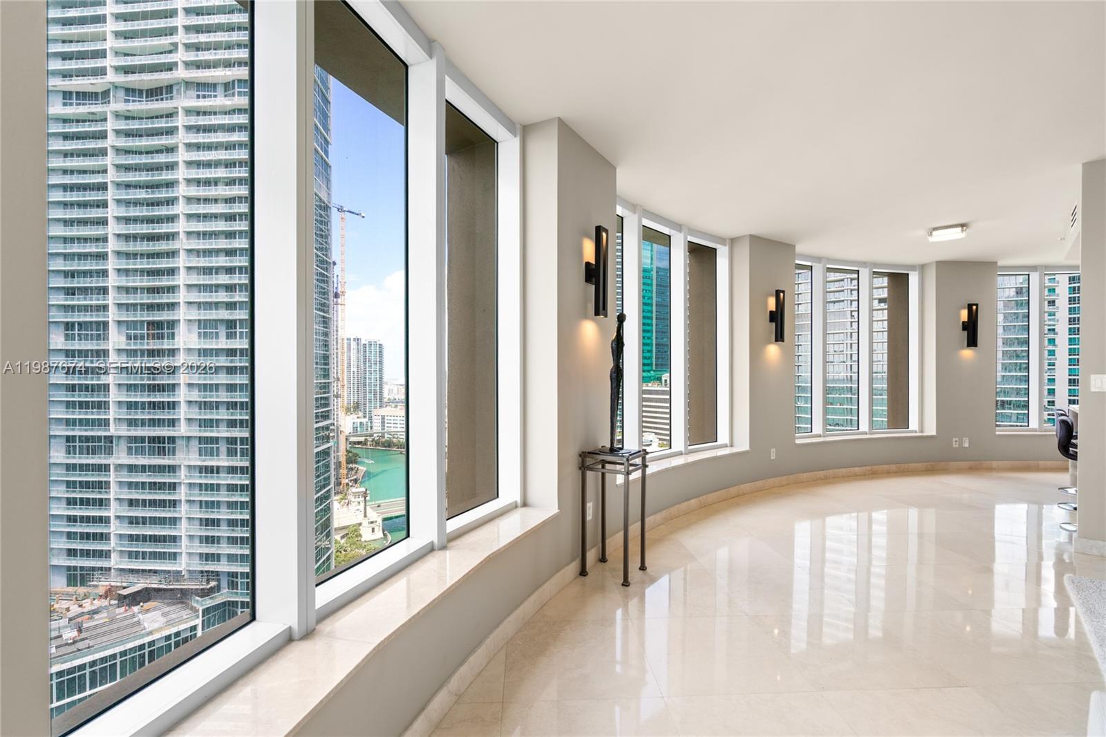 901 Brickell Key Boulevard, Unit 2804 Miami, FL 33131 - Photo 9 of 91 a view of an empty room and window