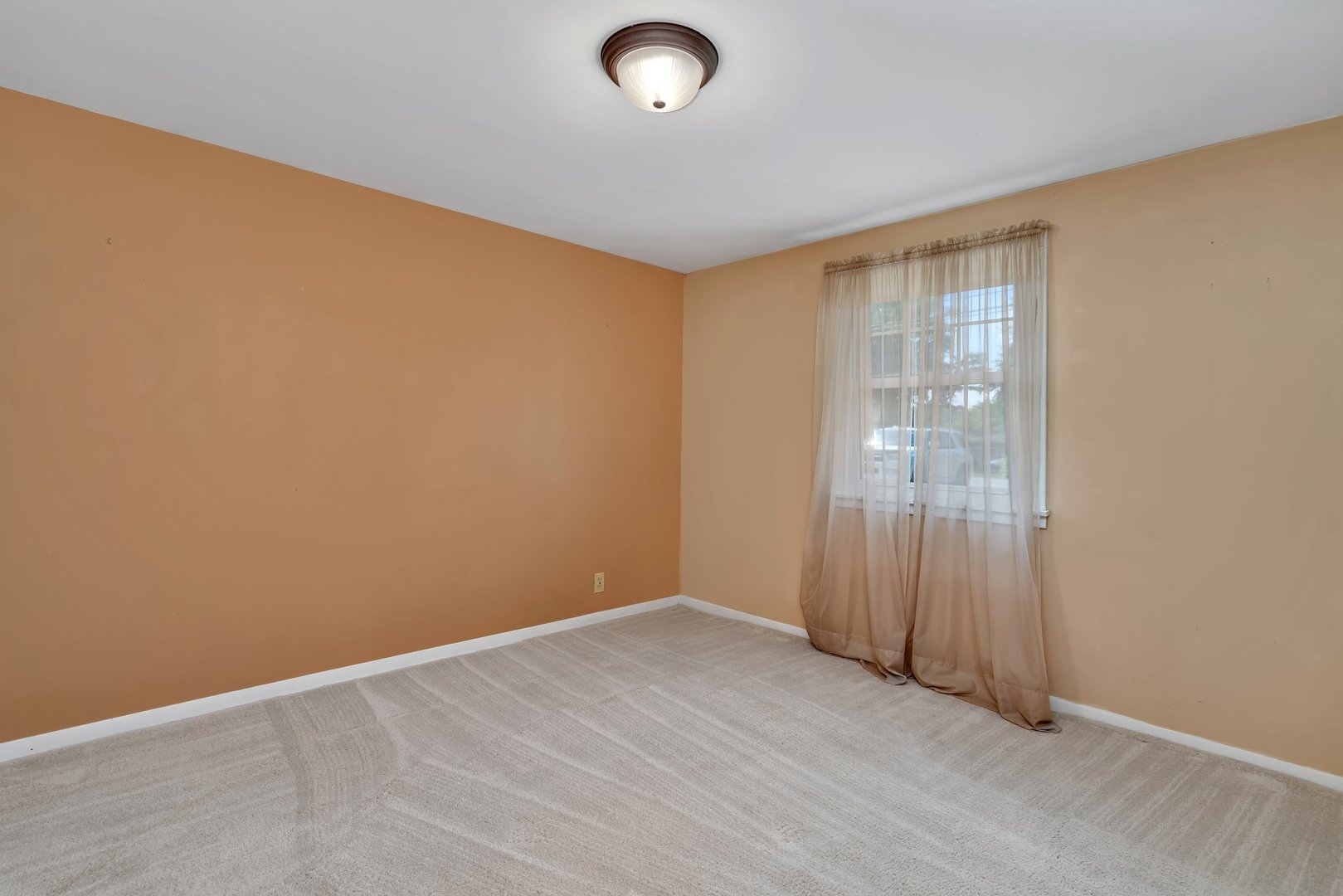 307 Bruce Road Lockport, IL 60441 - Photo 12 of 23 a view of an empty room with wooden floor and a window