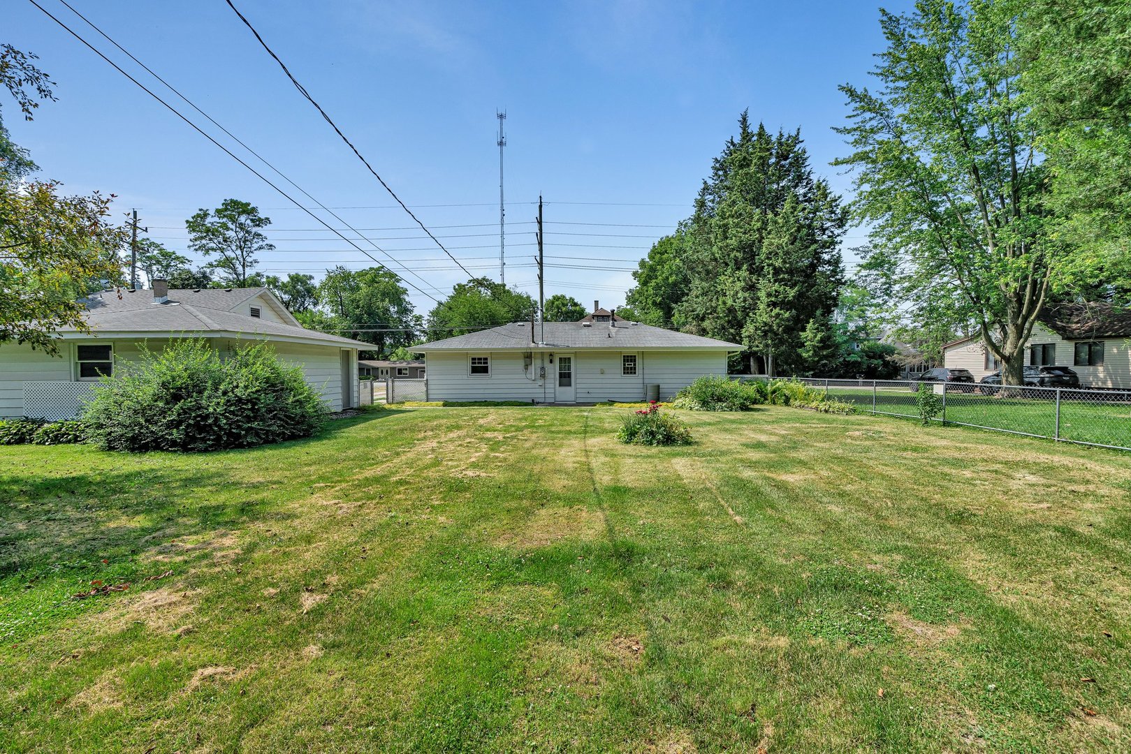 307 Bruce Road Lockport, IL 60441 - Photo 15 of 23 a front view of a house with a yard and trees