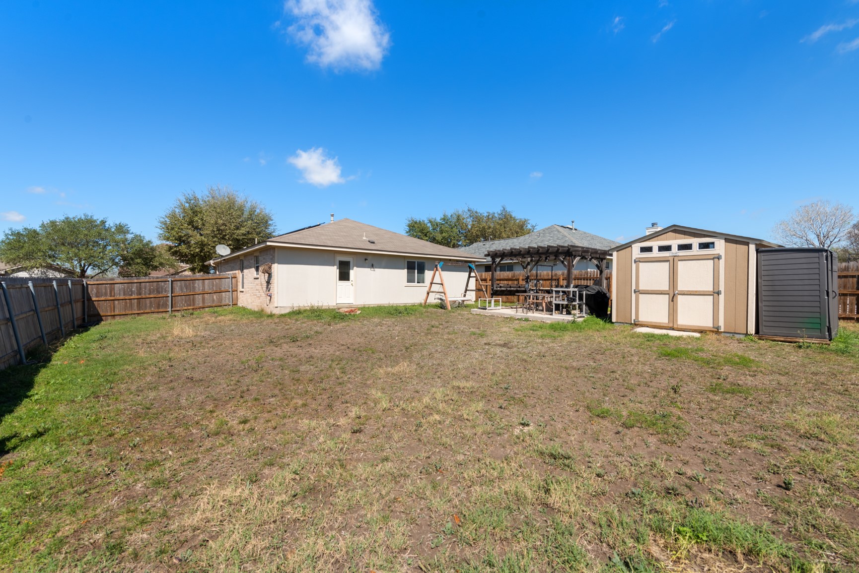 5501 English Avenue Austin, TX 78724 - Photo 15 of 19 a front view of a house with a yard and garage
