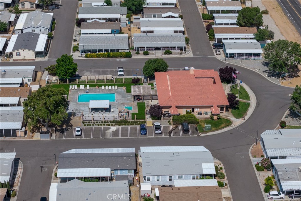 20843 Waalew Road, Unit C125 Apple Valley, CA 92307 - Photo 33 of 38 an aerial view of residential houses with outdoor space and street view