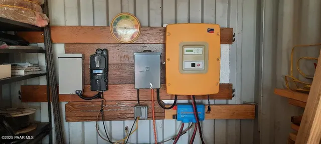 a view of walk in closet with clothes