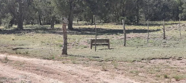 a view of a yard covered with snow
