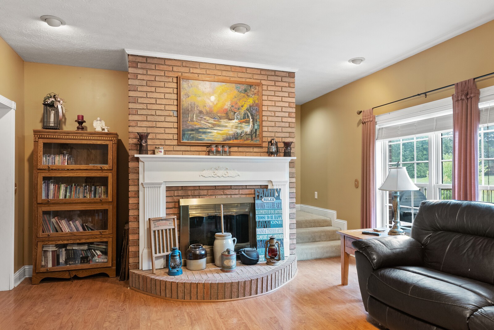 7336 Chowning Road Springfield, TN 37172 - Photo 12 of 45 a living room with furniture and a fireplace