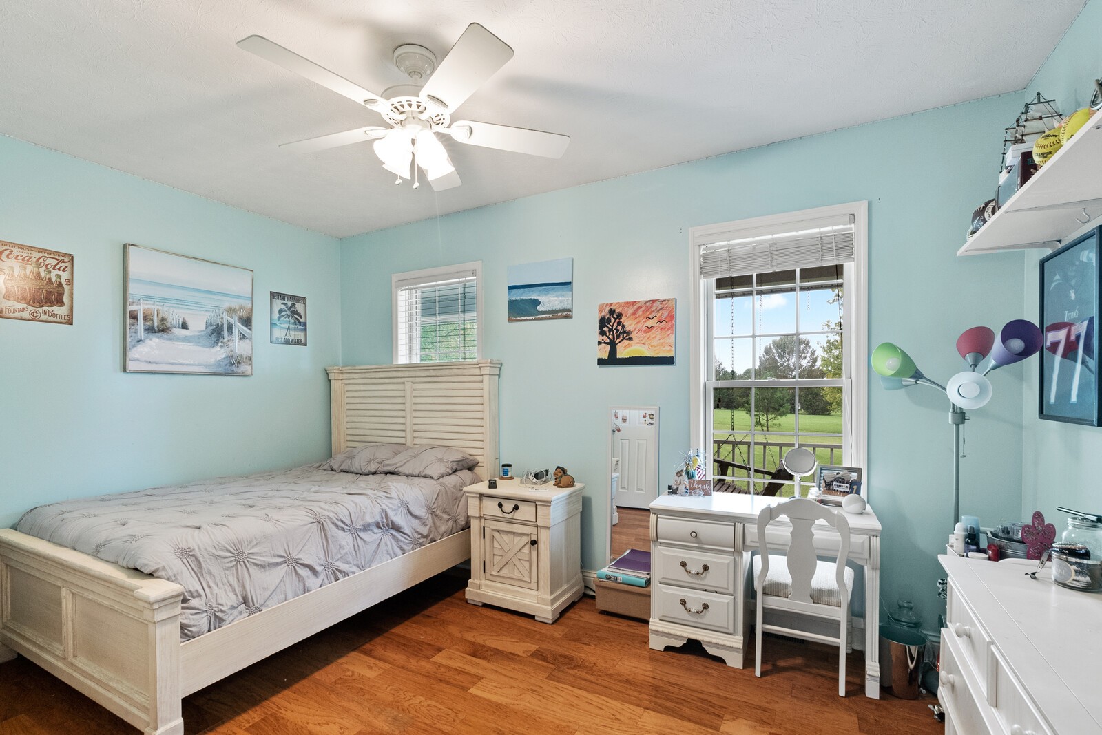 7336 Chowning Road Springfield, TN 37172 - Photo 24 of 45 a bedroom with a bed and a chandelier
