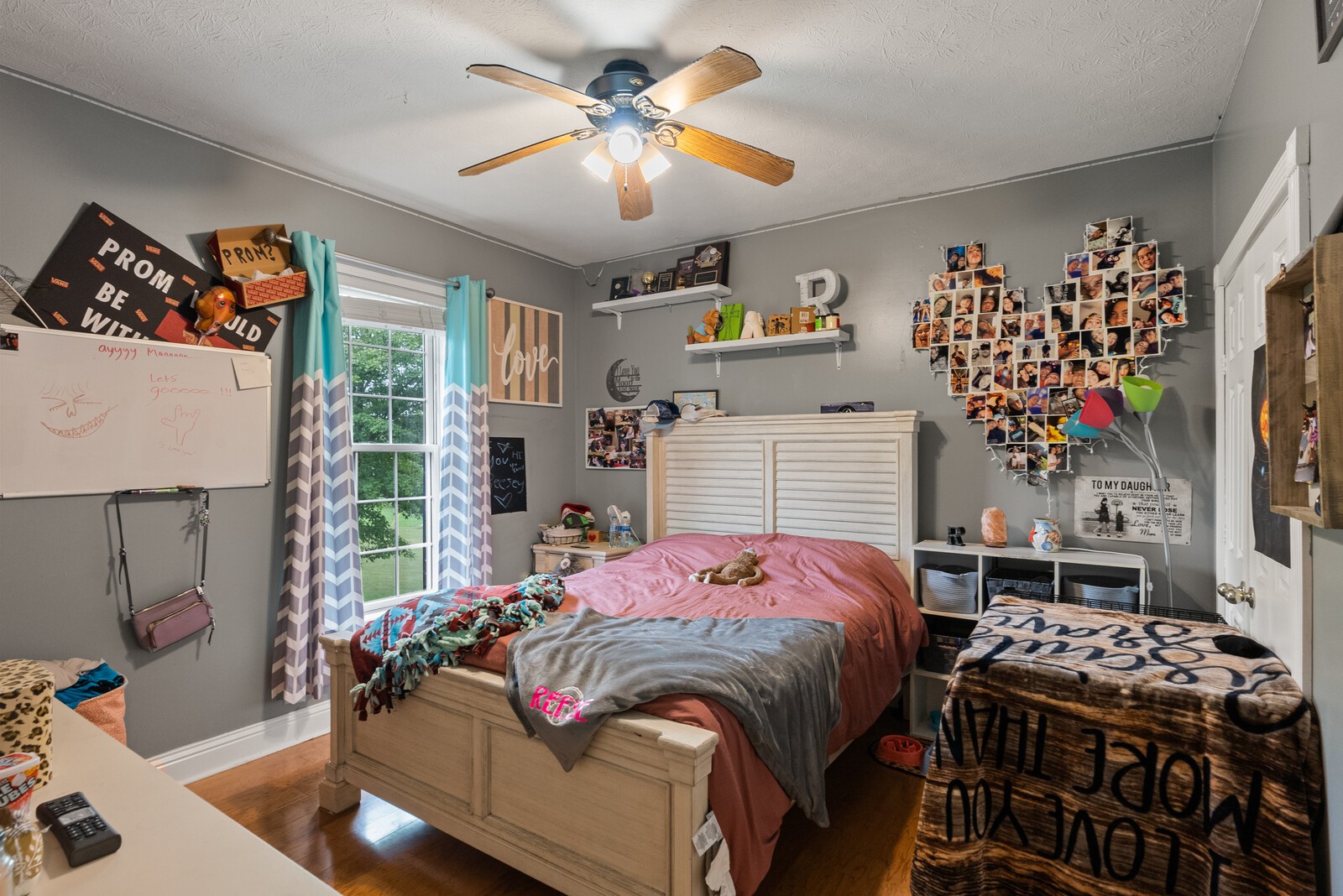 7336 Chowning Road Springfield, TN 37172 - Photo 25 of 45 a bedroom with bed and a chandelier