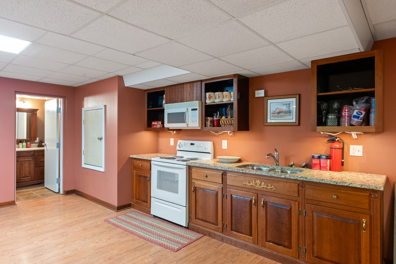 7336 Chowning Road Springfield, TN 37172 - Photo 32 of 45 a kitchen with stainless steel appliances granite countertop a sink stove and refrigerator
