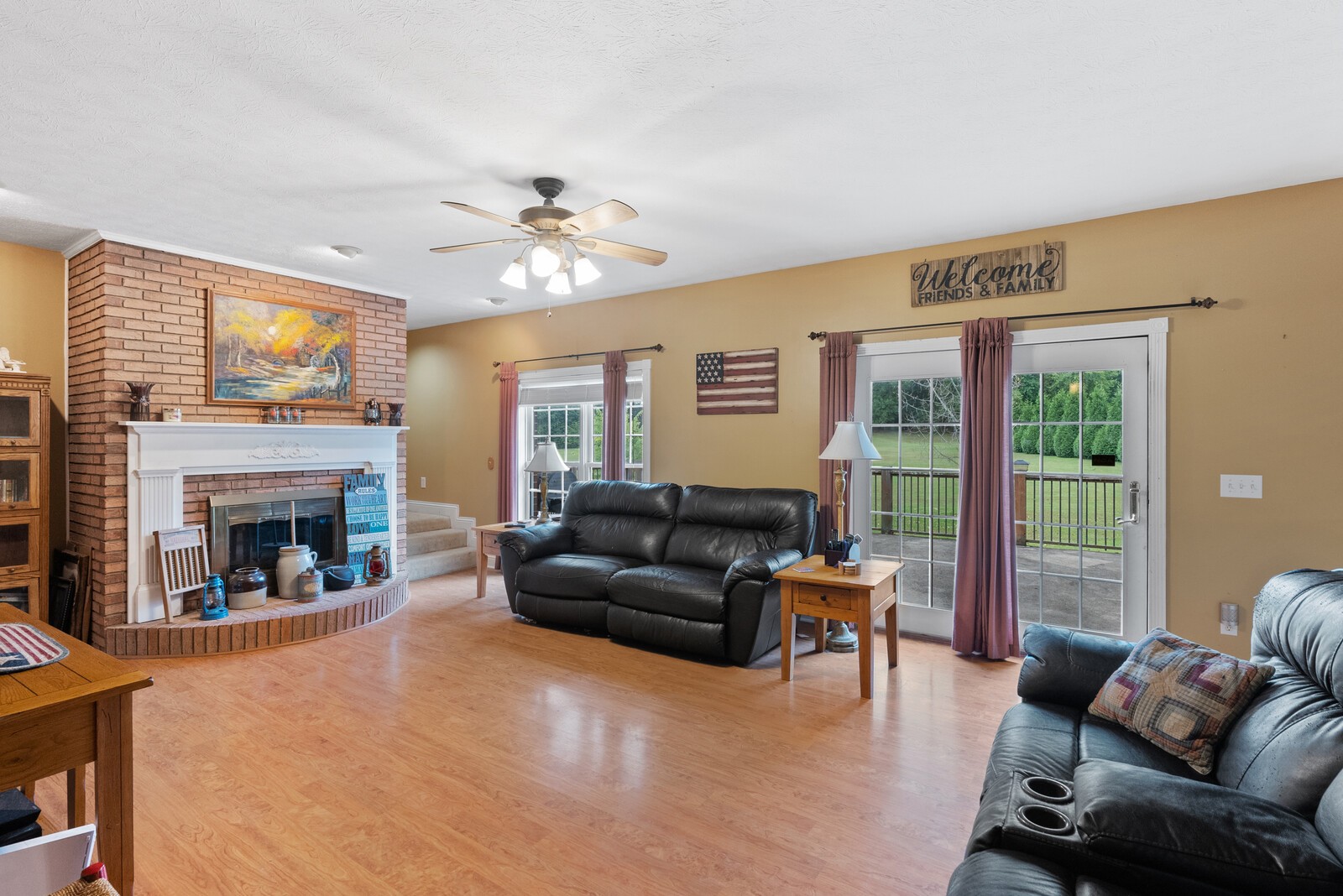 7336 Chowning Road Springfield, TN 37172 - Photo 9 of 45 a living room with furniture and a fireplace