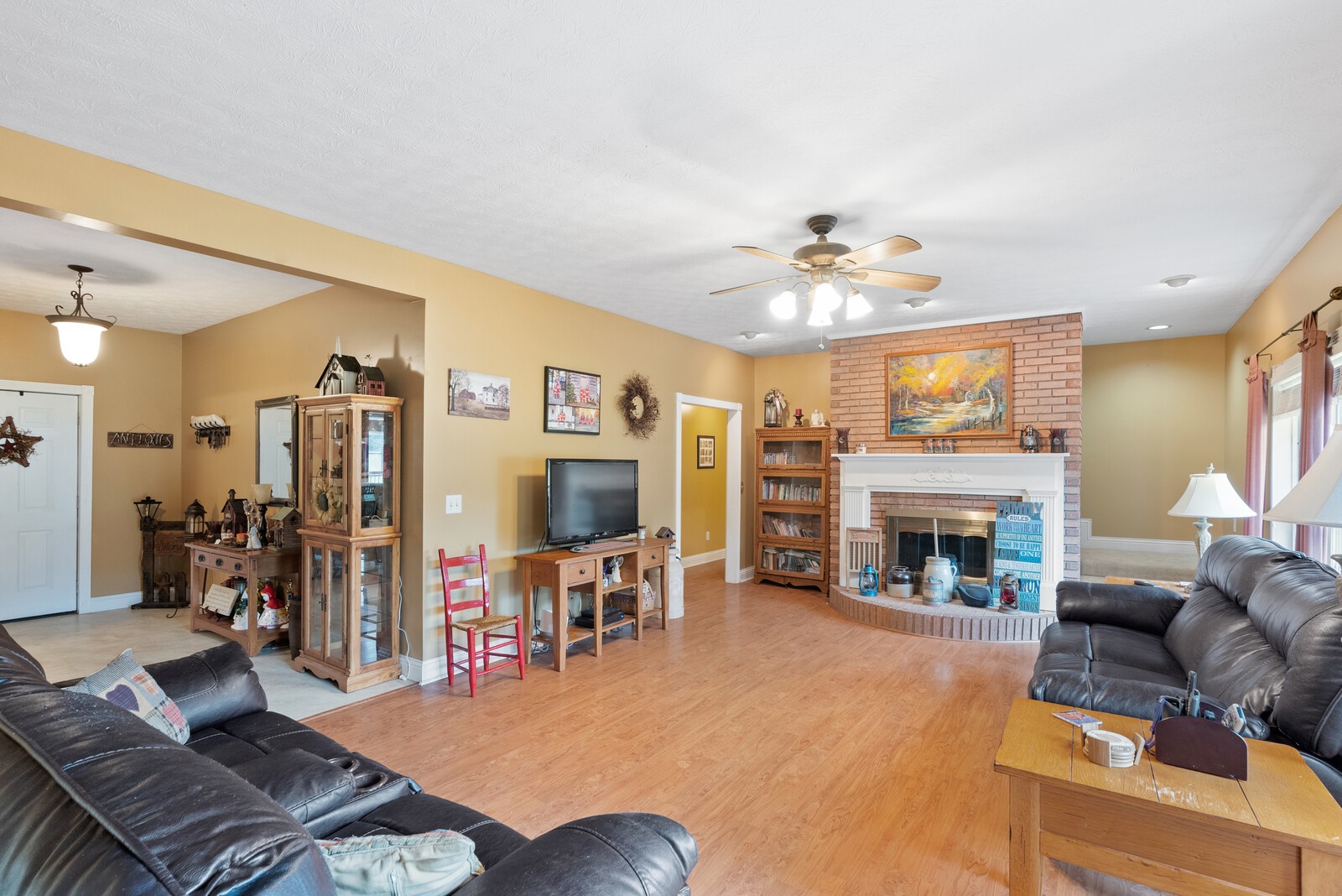7336 Chowning Road Springfield, TN 37172 - Photo 10 of 45 a living room with furniture and a fireplace