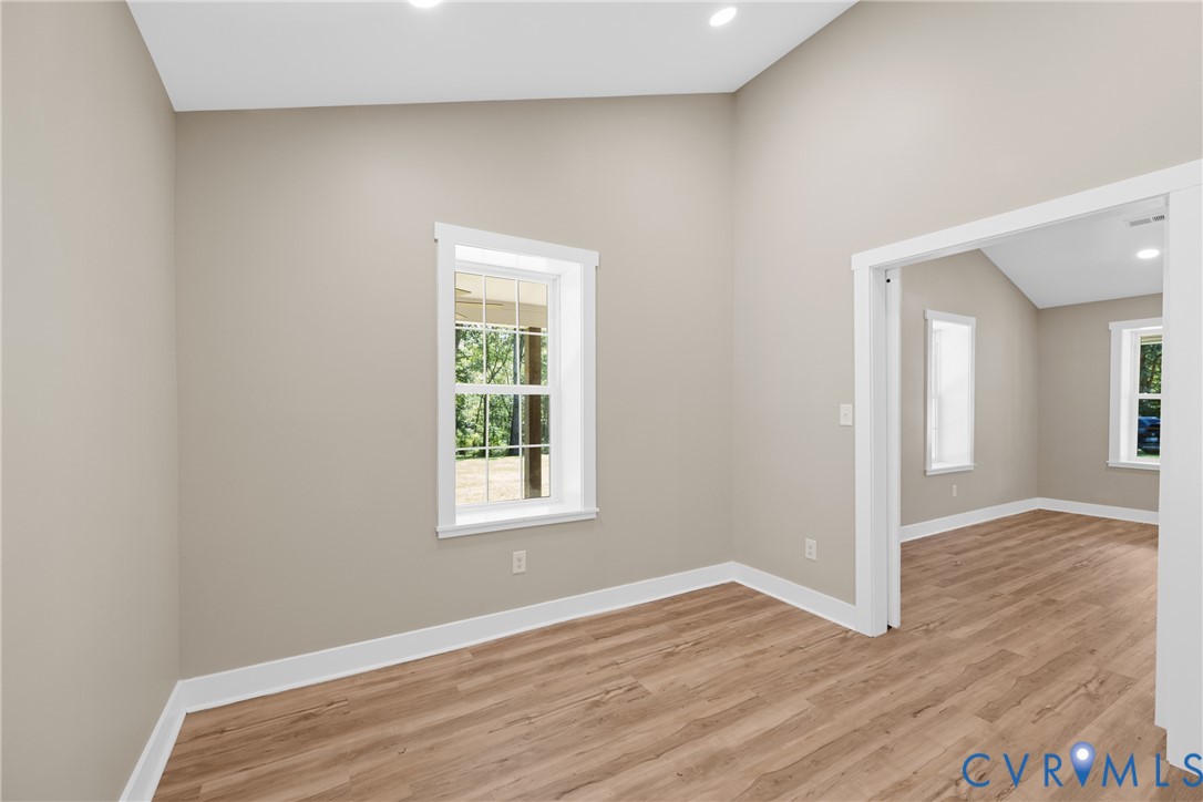 11905 Quaker Road Dinwiddie, VA 23841 - Photo 12 of 34 LVP flooring throughout, vaulted ceiling, recessed