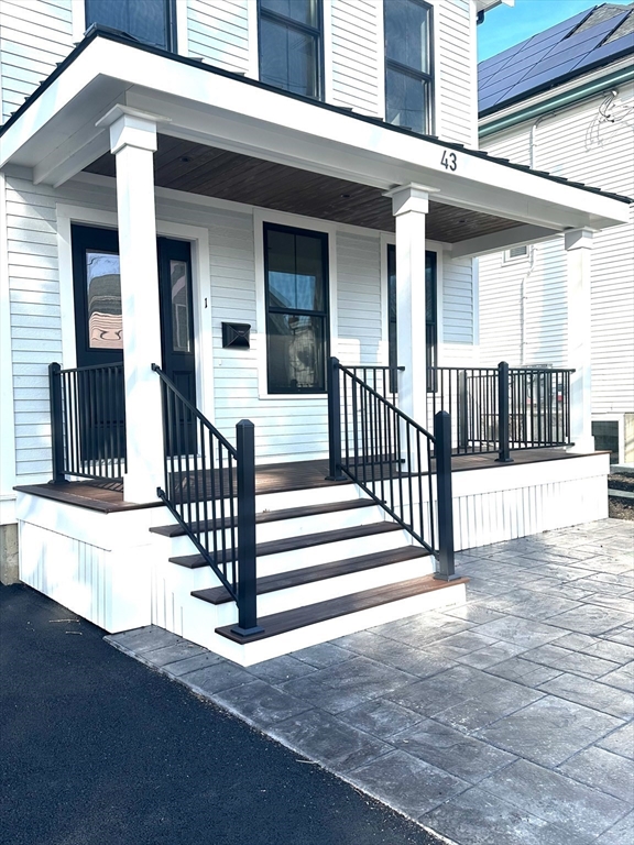 43 Chickatawbut Street, Unit 1 Boston, MA 02122 - Photo 2 of 42 a view of a house with a fence and a porch