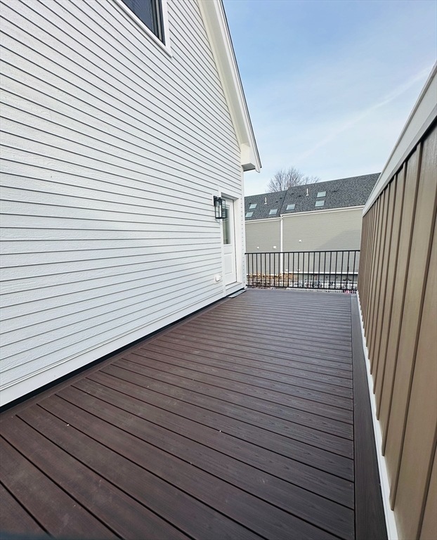 43 Chickatawbut Street, Unit 1 Boston, MA 02122 - Photo 24 of 42 a view of a wooden deck