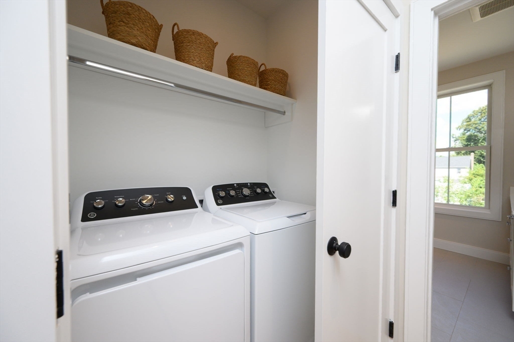 43 Chickatawbut Street, Unit 1 Boston, MA 02122 - Photo 36 of 42 a close up view of washer and dryer