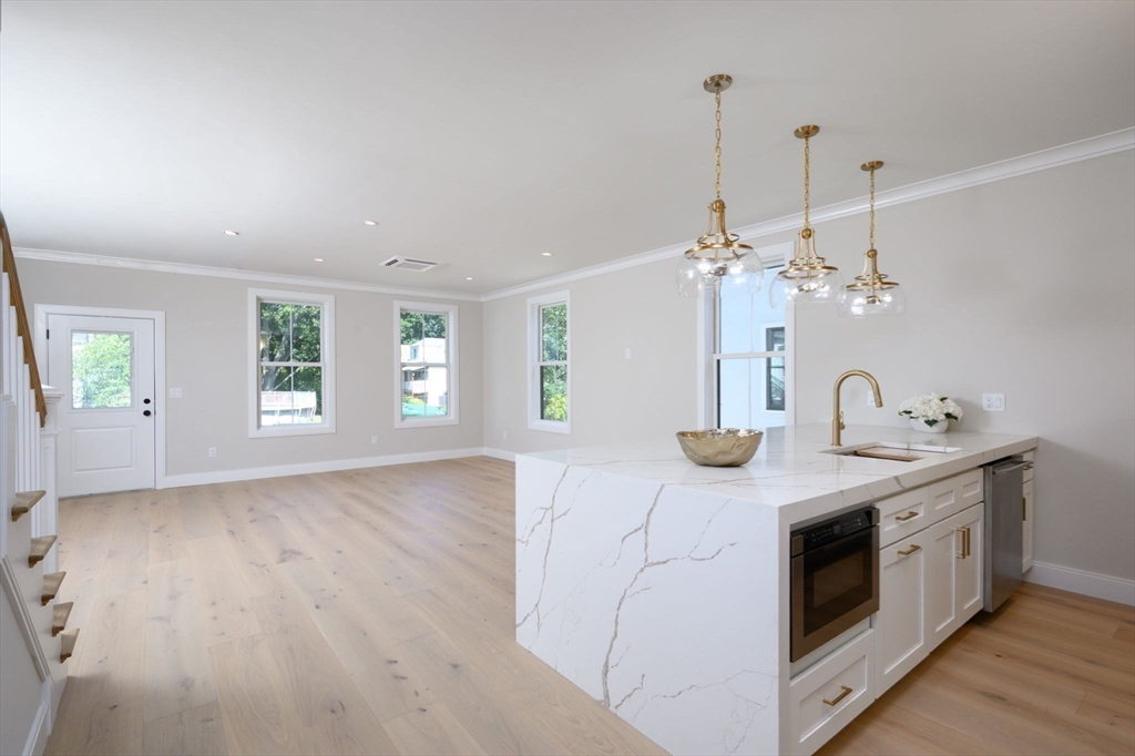 43 Chickatawbut Street, Unit 1 Boston, MA 02122 - Photo 7 of 42 a kitchen with a sink and window
